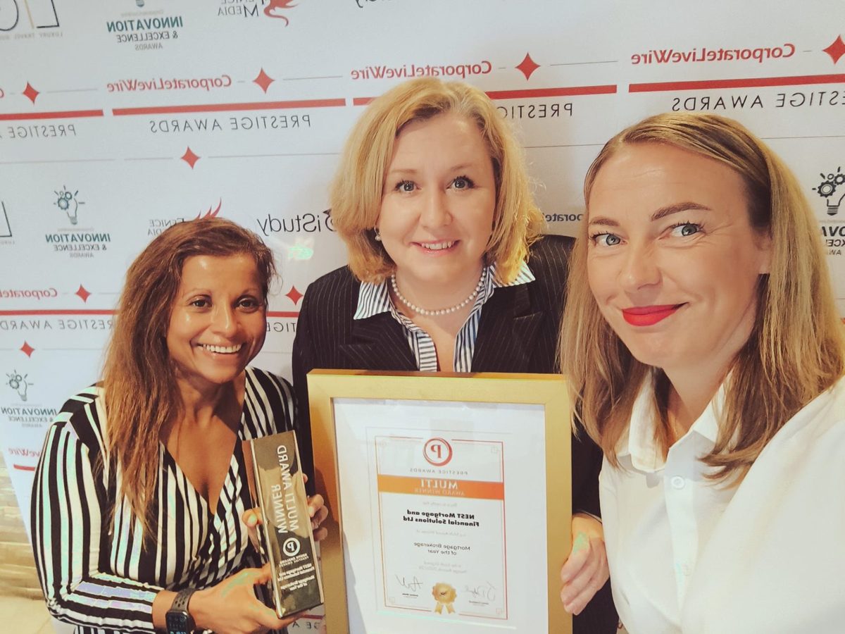 The NEST team celebrating an industry award